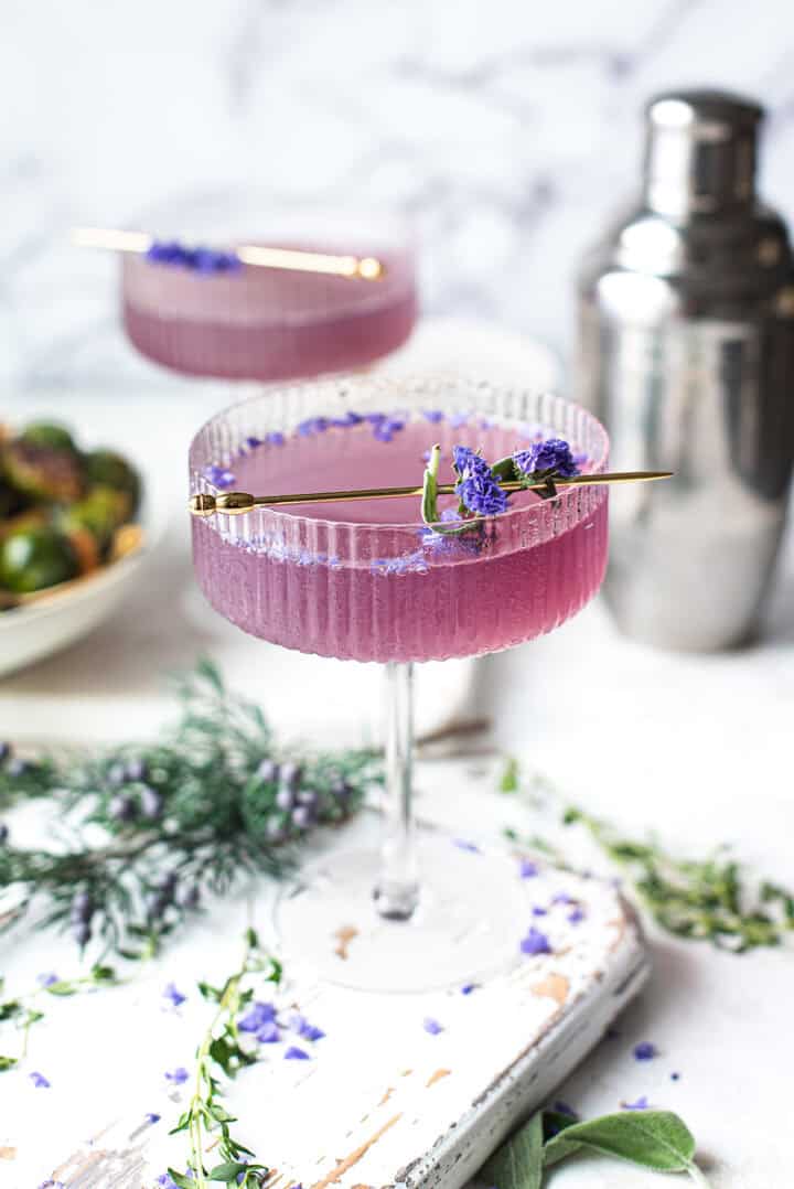 sparkling purple gin cocktail in coupe glass made with Empress 1908 gin