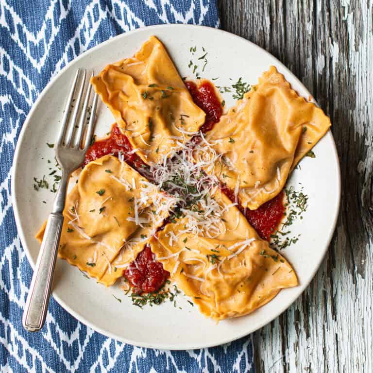 homemade ravioli filled with chorizo and ricotta, served with tomato sauce