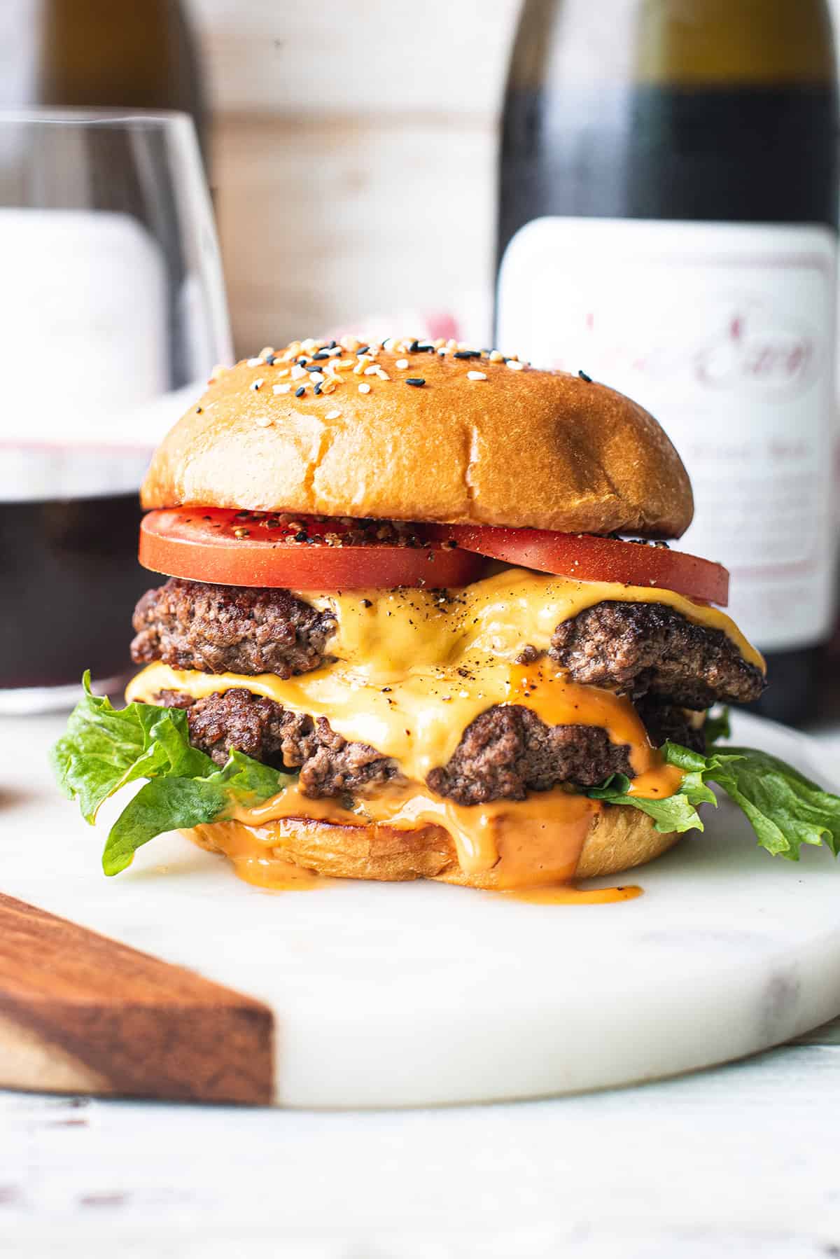 homemade smash burger recipe with double patties and melted cheese on a brioche bun