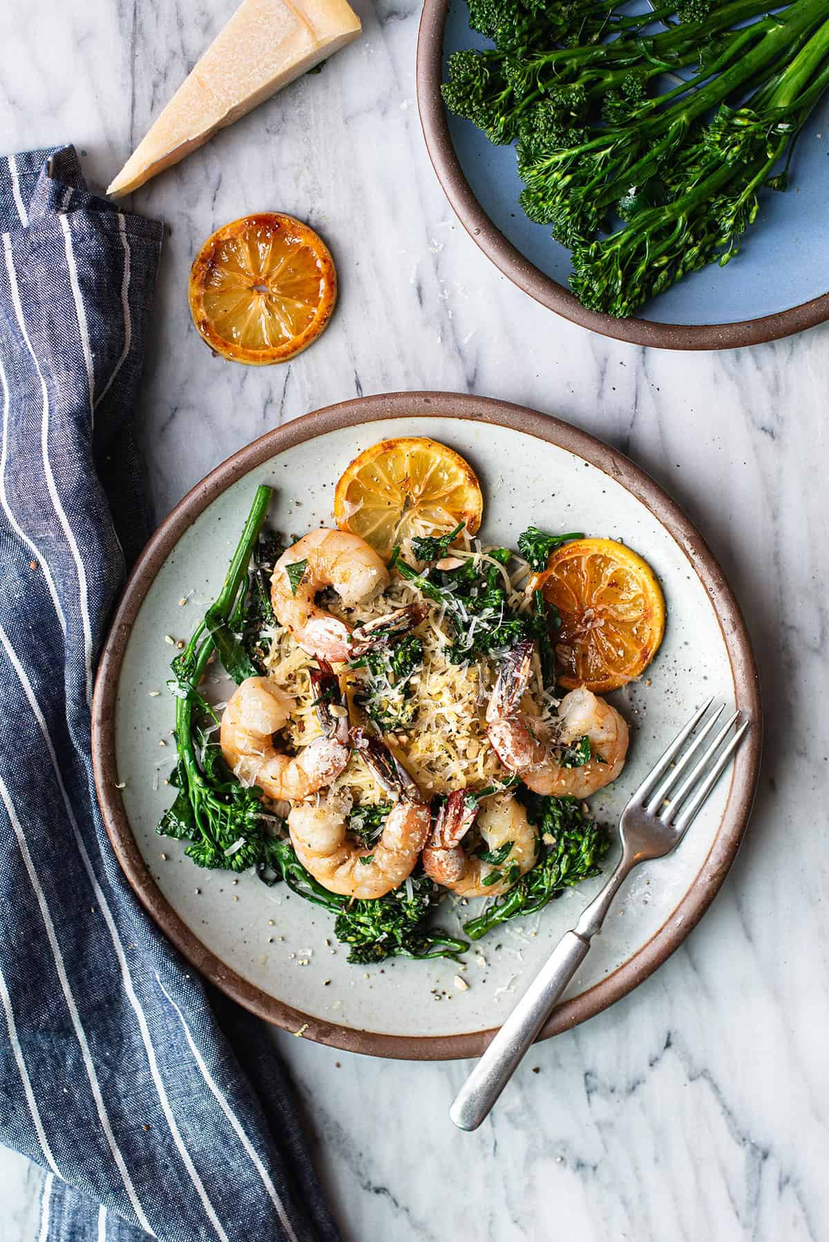 lemony shrimp pasta on a plate with fork