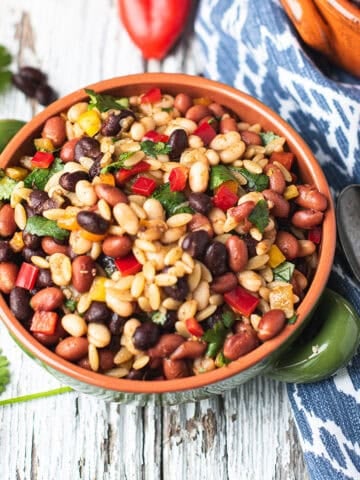 southwestern bean salad with orzo, lime dressing, and fresh vegetables