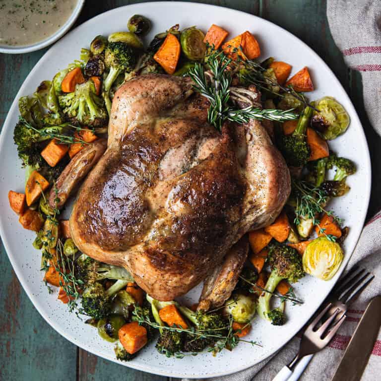 whole roasted chicken with crispy skin and juicy meat