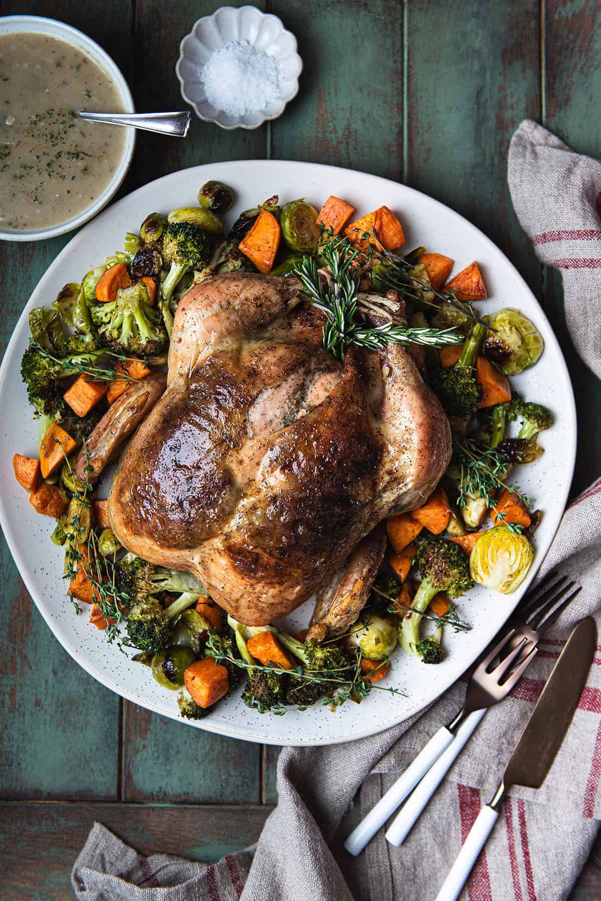 whole roasted chicken with crispy skin and juicy mean